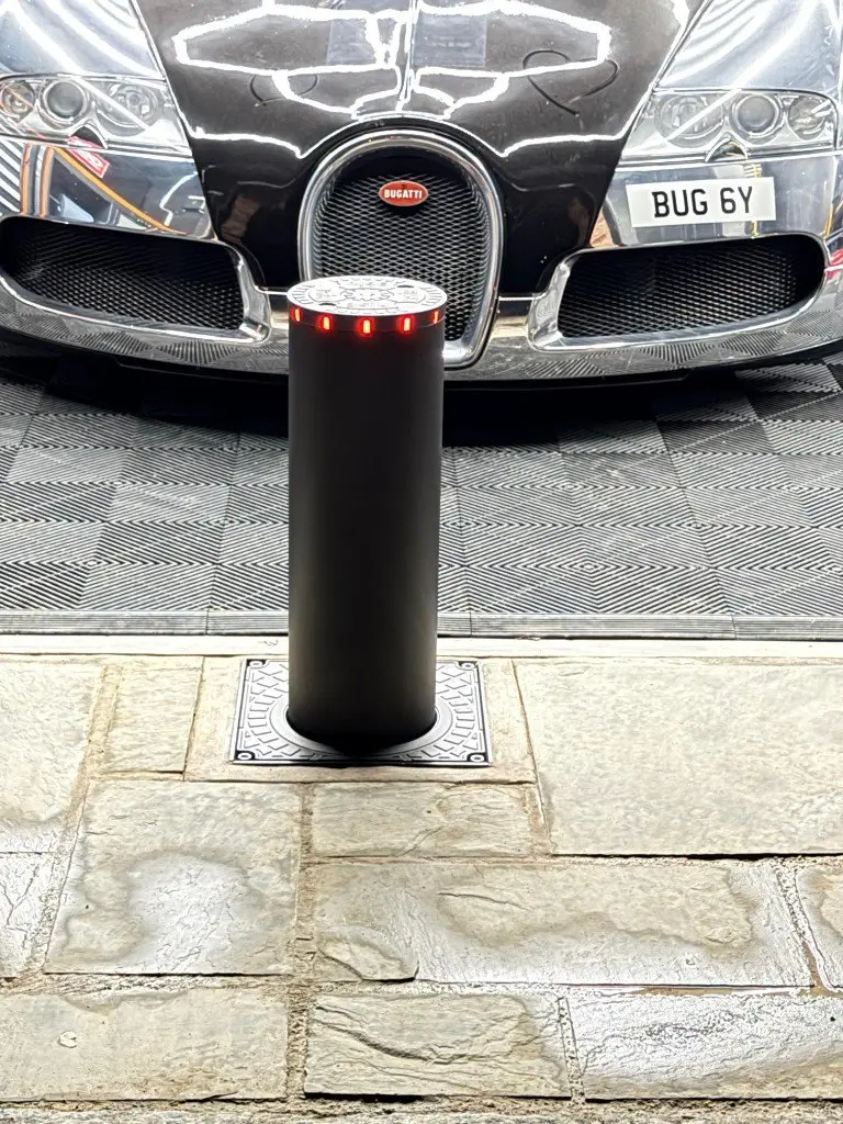 Bugatti protected by a rising bollard