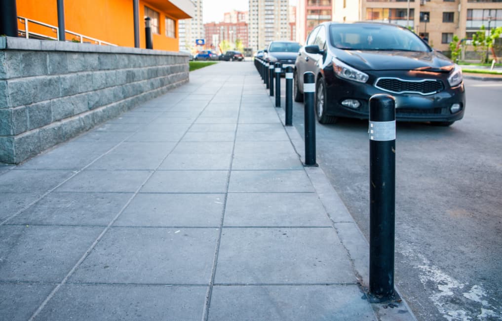 Security Bollards next to vehicle