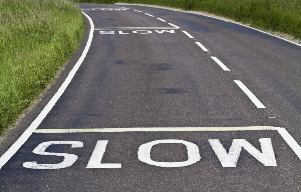 Slow markings on road