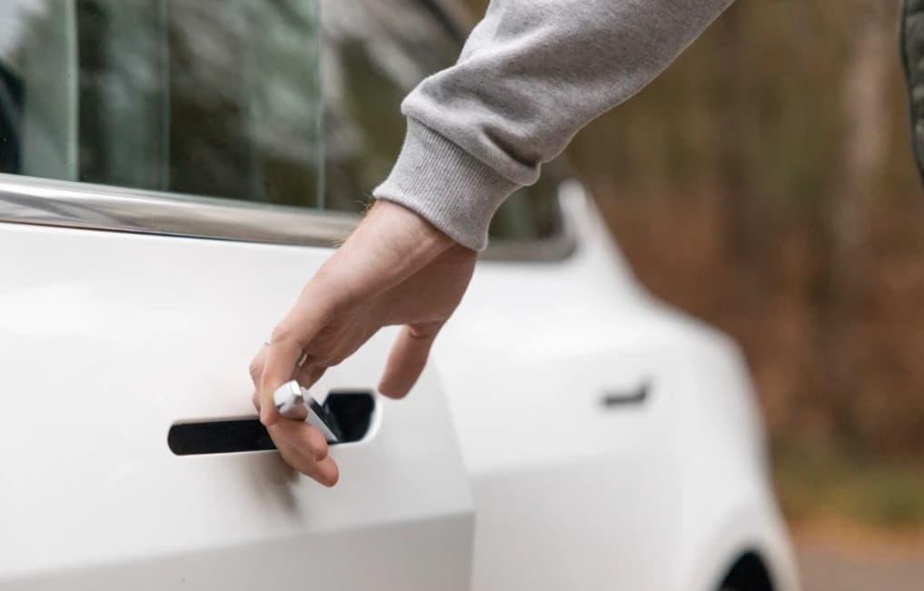 Man opening car door