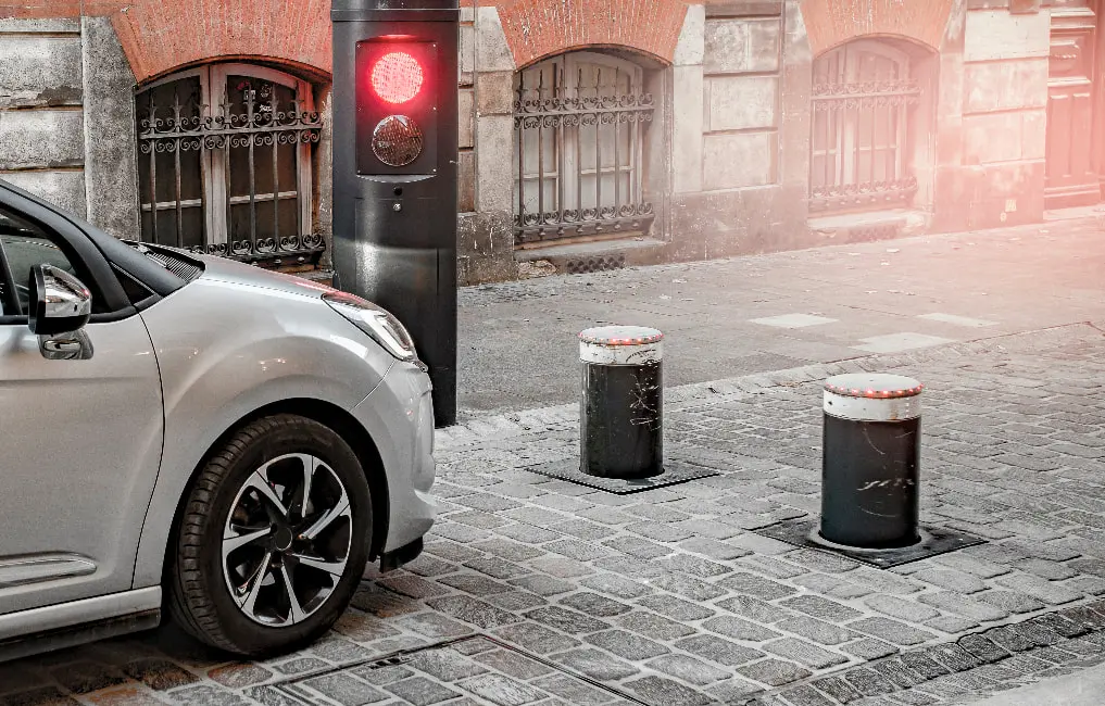 car stopped at bollard