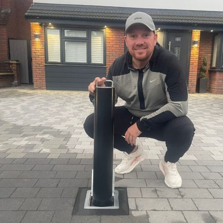 Jamie O Hara smiling with bollard